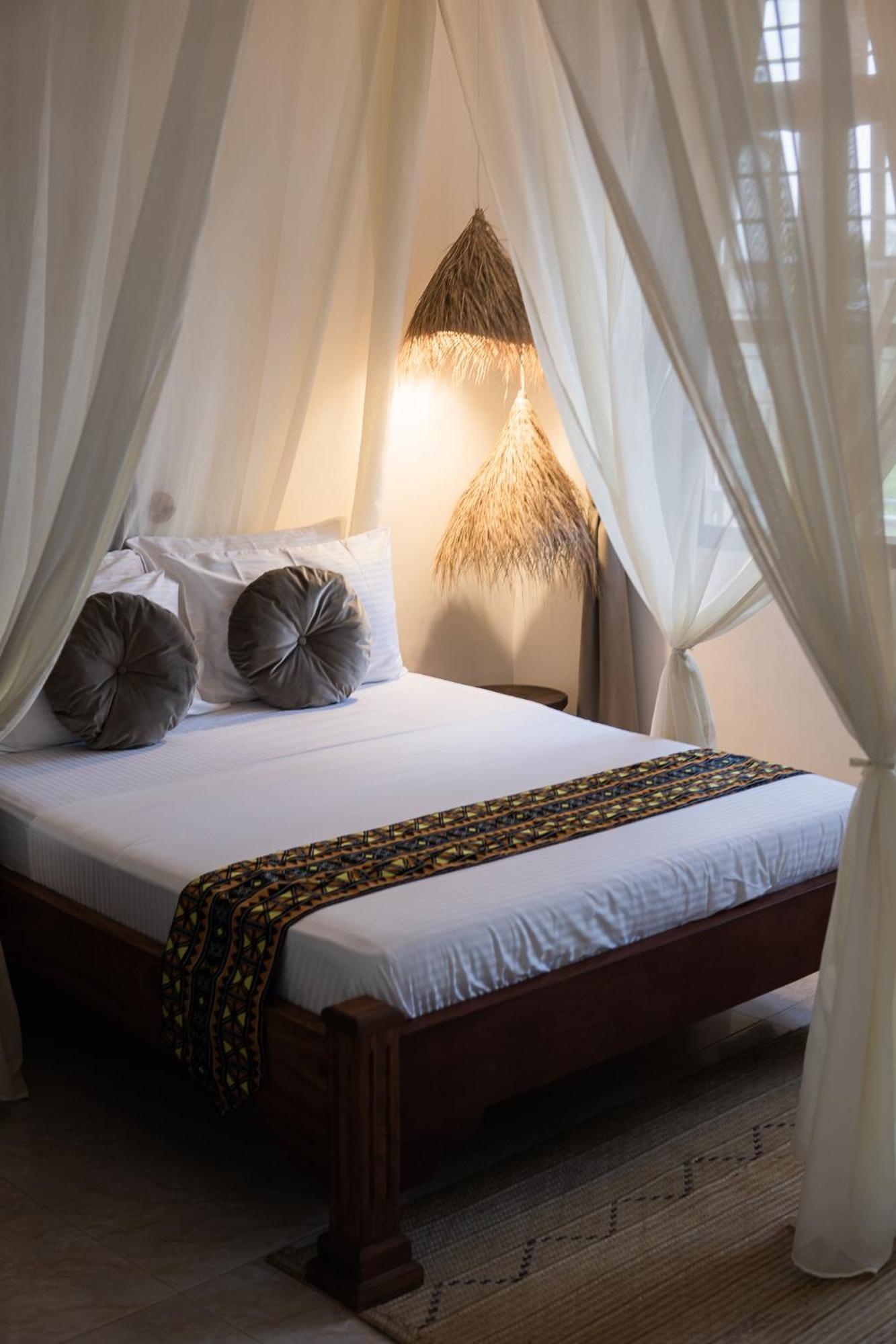 Kima Serviced Beach House & Suites Буэхуу Экстерьер фото